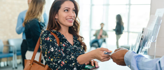 A woman at a credit union, Prepaid-legal