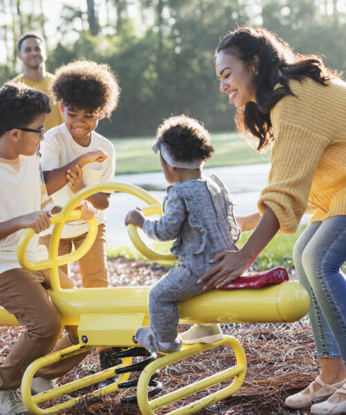A mixed race family with three children