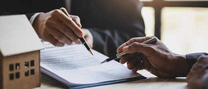 A lawyer consults with a client about estate planning