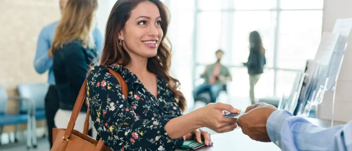 A woman at a credit union, Prepaid-legal